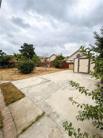 a view of swimming pool with a yard