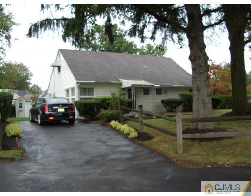 2 Colfax Road Edison, NJ 08817 - Photo 1 of 25 a view of a house with a patio