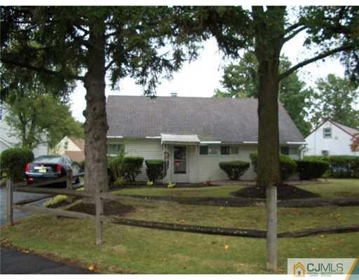 2 Colfax Road Edison, NJ 08817 - Photo 2 of 25 front view of a house with a yard