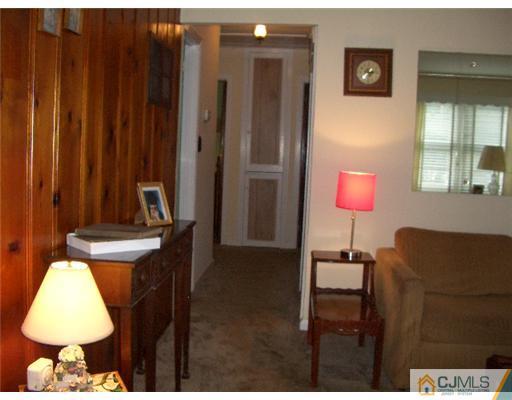 2 Colfax Road Edison, NJ 08817 - Photo 11 of 25 a bathroom with a sink and a mirror