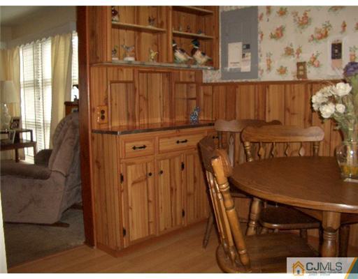 2 Colfax Road Edison, NJ 08817 - Photo 8 of 25 a view of a chairs and table in kitchen