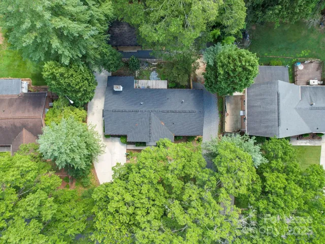 an aerial view of a house and garden