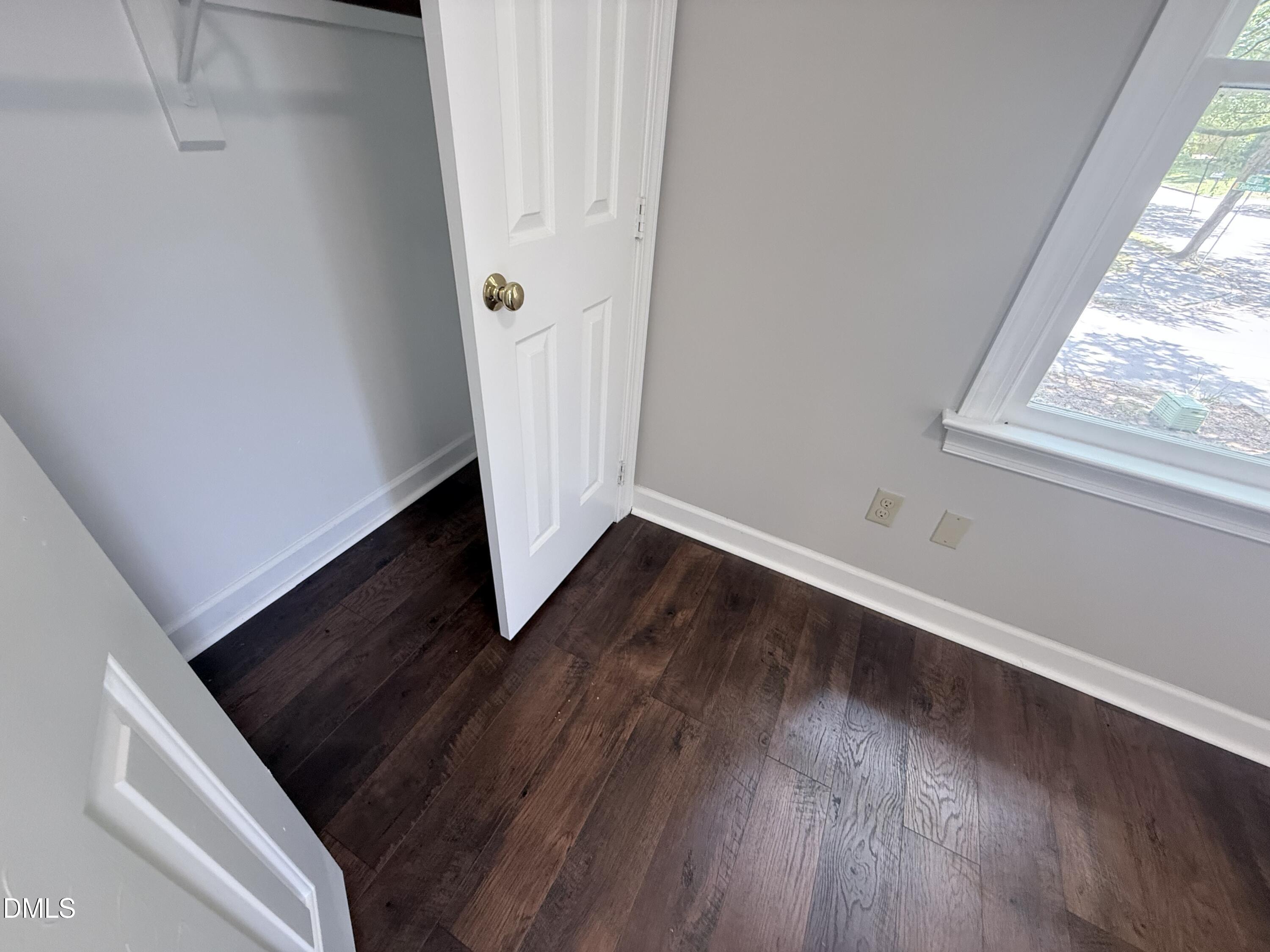 2900 Broadlands Drive Raleigh, NC 27604 - Photo 50 of 60 a view of an empty room and wooden floor