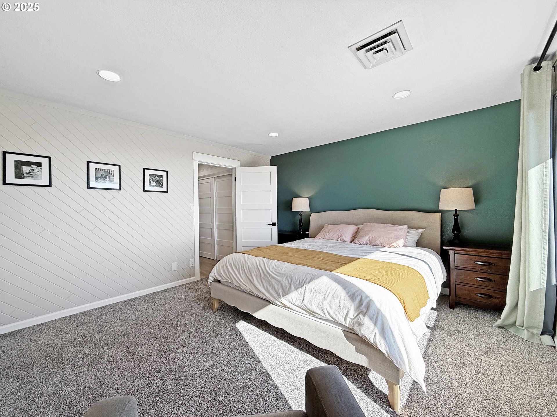18950 Timeus Ranch Road Brookings, OR 97415 - Photo 17 of 47 a bedroom with a bed and painting on the wall
