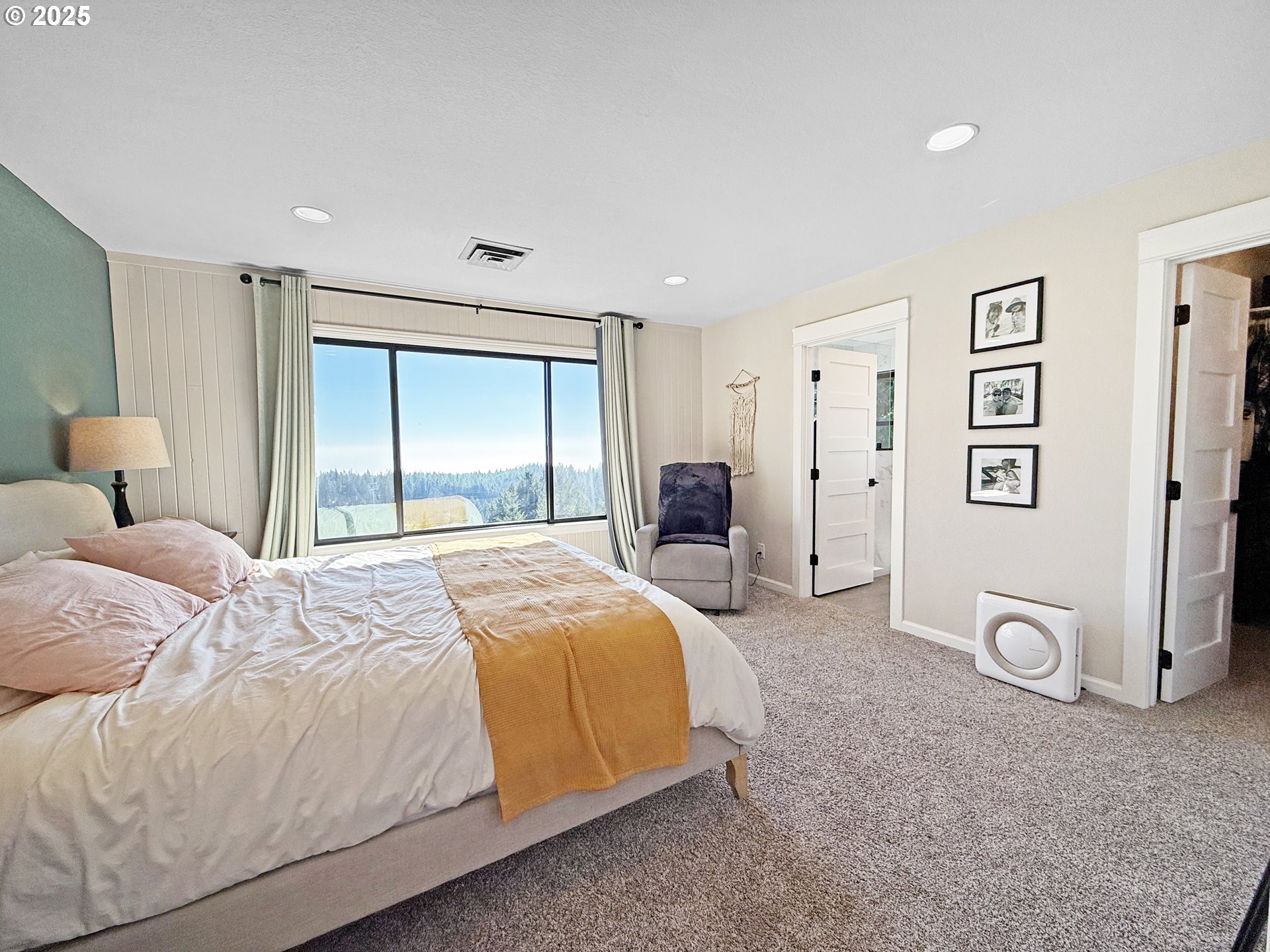 18950 Timeus Ranch Road Brookings, OR 97415 - Photo 19 of 47 a bedroom with a bed and a large mirror