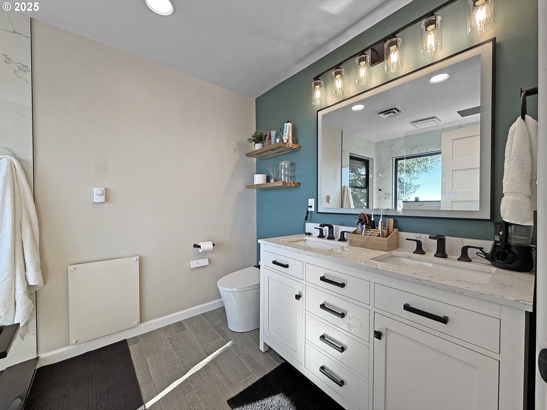 18950 Timeus Ranch Road Brookings, OR 97415 - Photo 20 of 47 a bathroom with a double vanity sink mirror and double