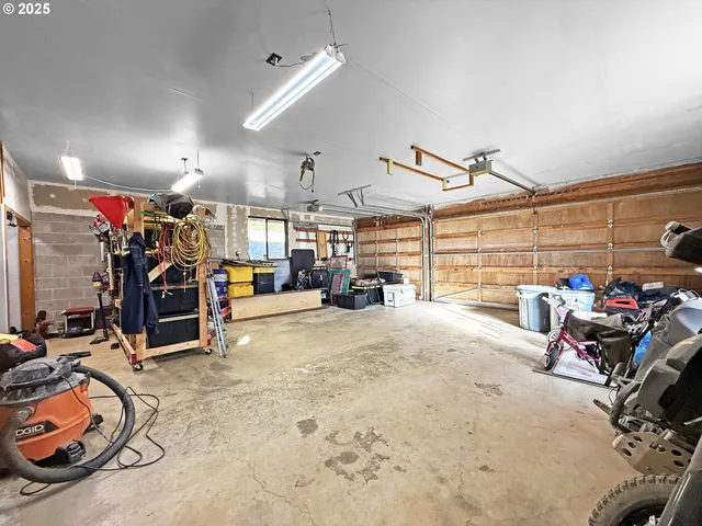 a view of a garage with a bike and storage