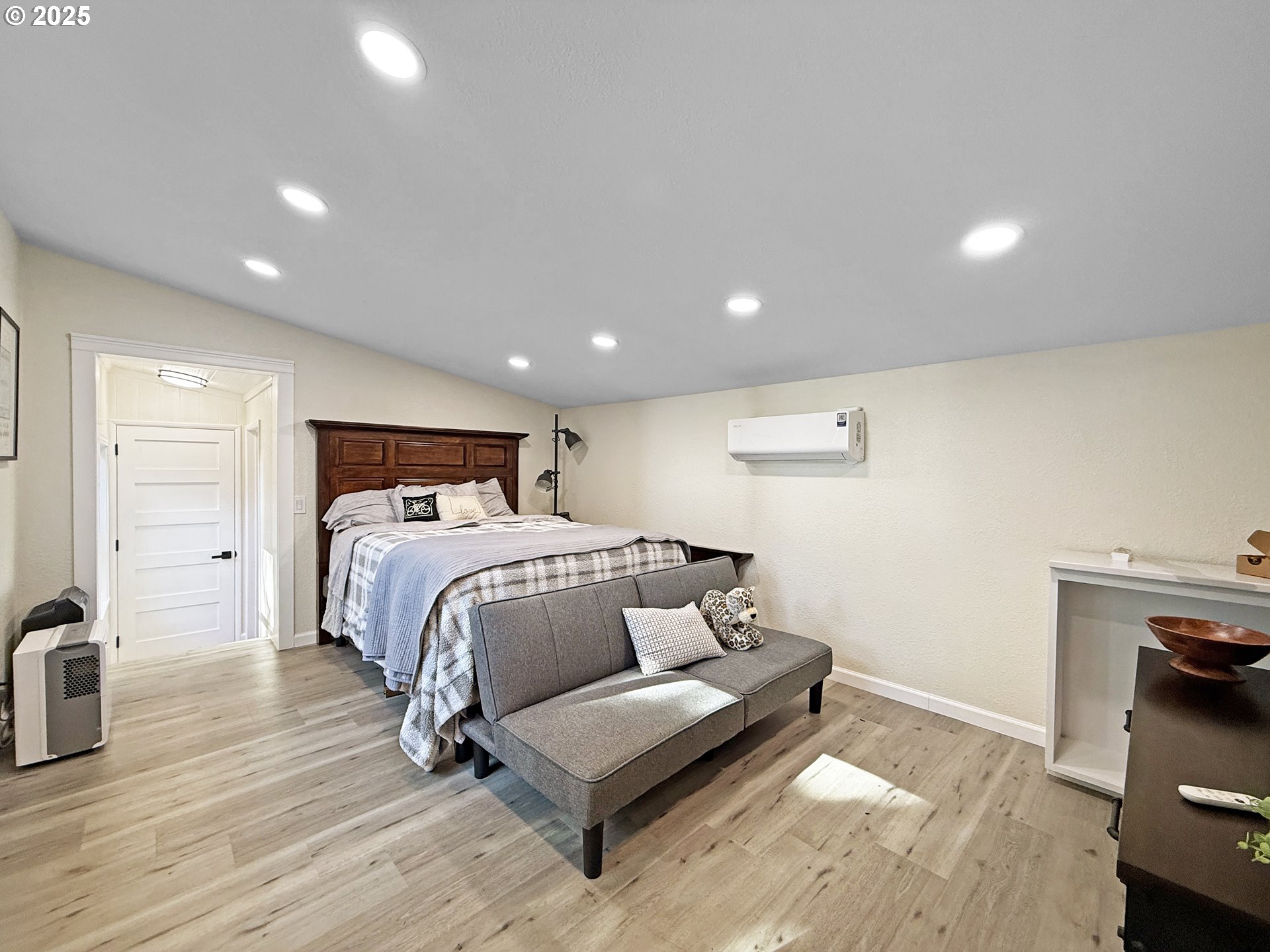 18950 Timeus Ranch Road Brookings, OR 97415 - Photo 41 of 47 a bed room with a bed and a chair