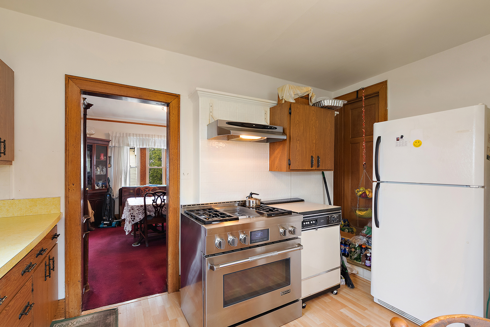 17930 Homewood Avenue Homewood, IL 60430 - Photo 11 of 30 a kitchen with a stove and a refrigerator