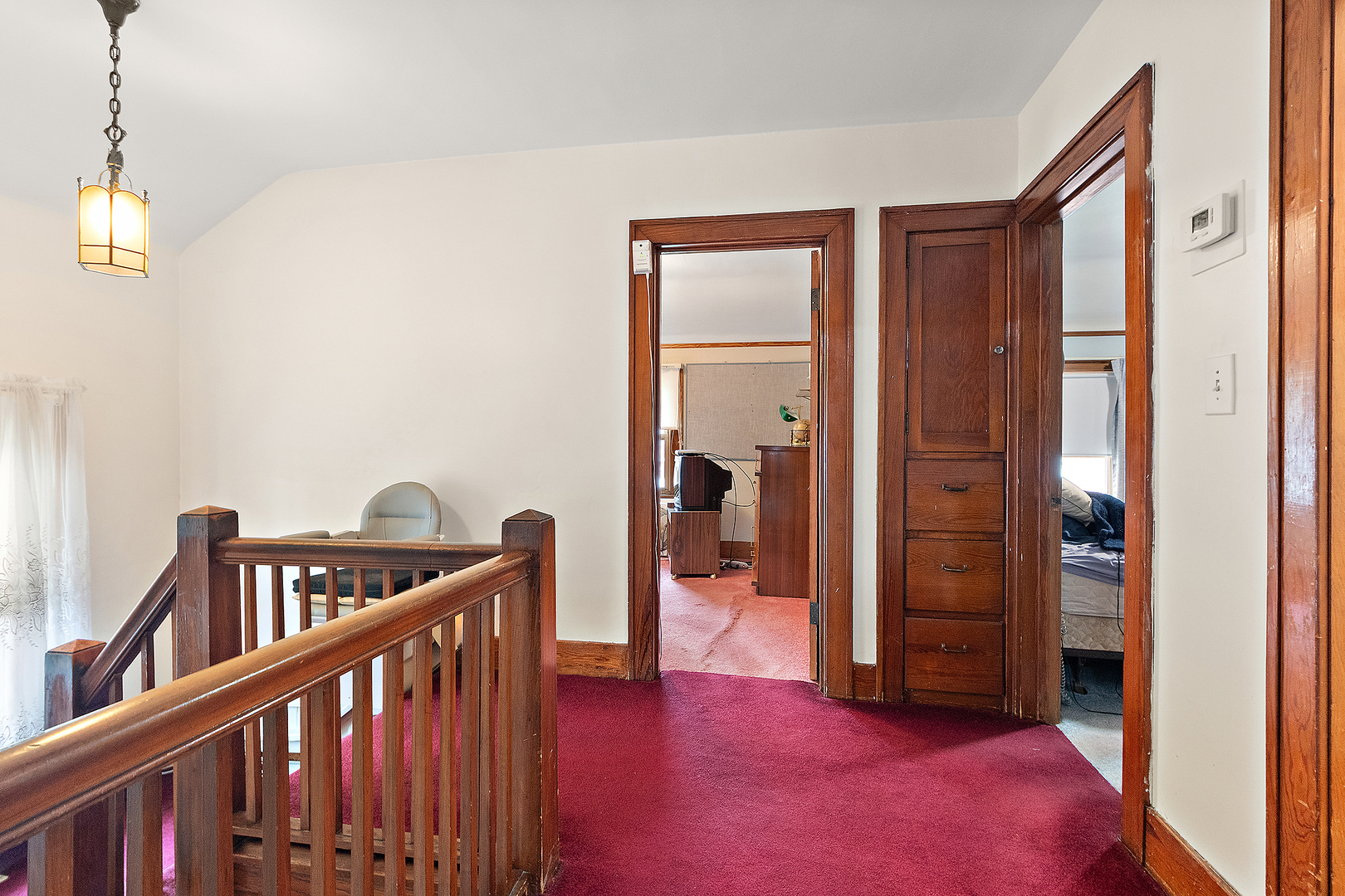 17930 Homewood Avenue Homewood, IL 60430 - Photo 14 of 30 a view of a hallway with wooden floor and windows