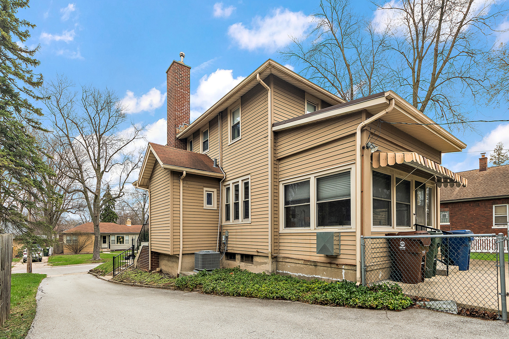 17930 Homewood Avenue Homewood, IL 60430 - Photo 22 of 30 a front view of a house with a yard