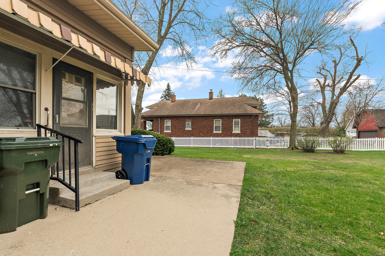 17930 Homewood Avenue Homewood, IL 60430 - Photo 25 of 30 a front view of a house with garden