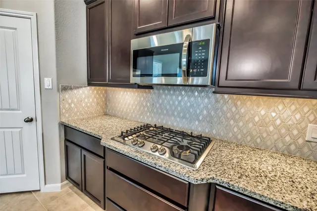 a view of room with rack on the wall