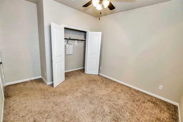 a bathroom with a toilet and a bathtub