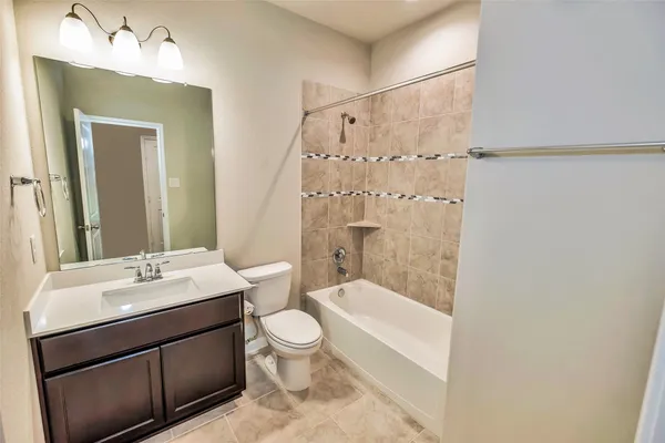 a view of a livingroom with wooden floor