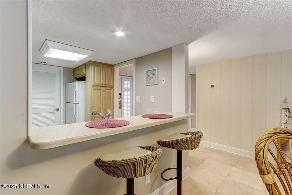 2122 Beachwood Road, Unit 2122 Fernandina Beach, FL 32034 - Photo 11 of 41 a bathroom with a sink and a mirror