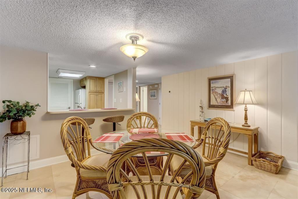 2122 Beachwood Road, Unit 2122 Fernandina Beach, FL 32034 - Photo 12 of 41 a view of a dining room with furniture