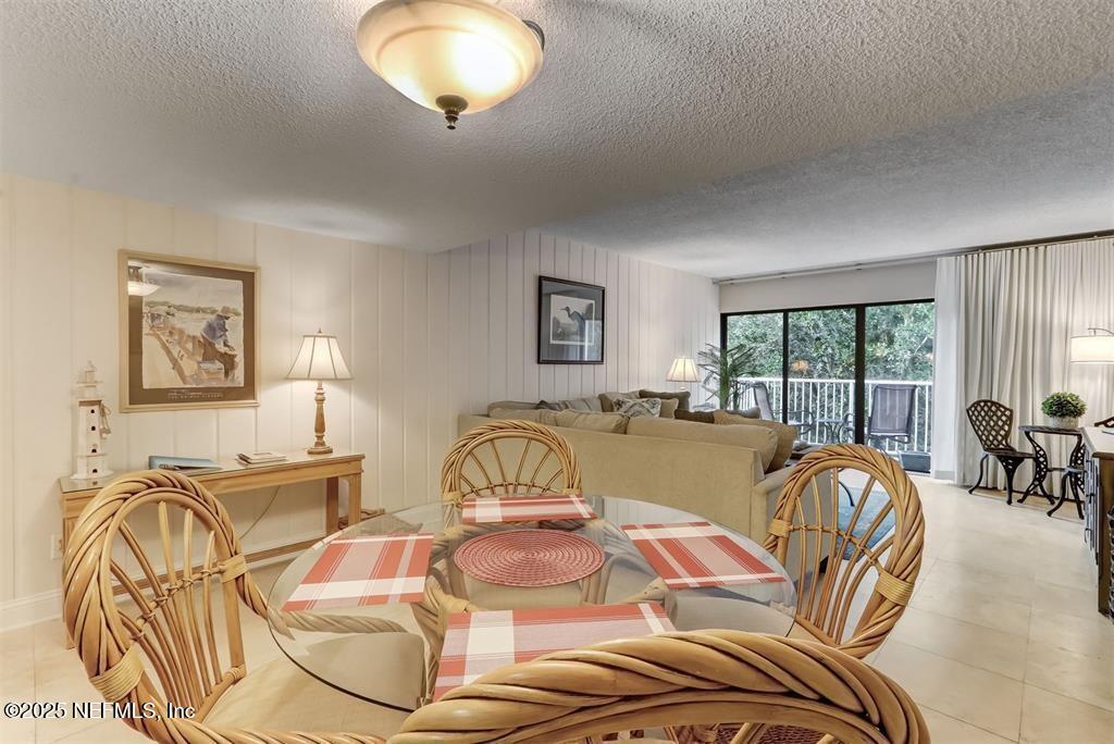 2122 Beachwood Road, Unit 2122 Fernandina Beach, FL 32034 - Photo 13 of 41 a view of a dining room with furniture