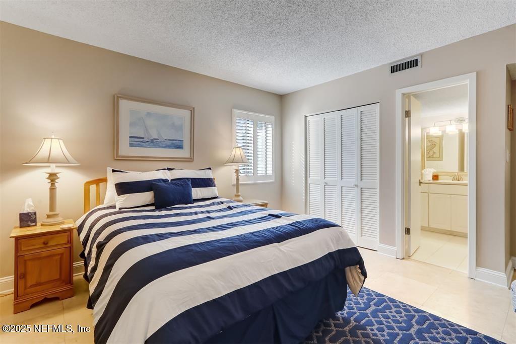 2122 Beachwood Road, Unit 2122 Fernandina Beach, FL 32034 - Photo 21 of 41 a bedroom with bed and a window