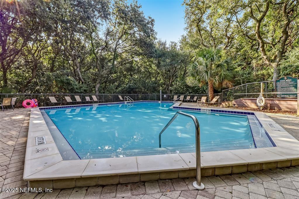 2122 Beachwood Road, Unit 2122 Fernandina Beach, FL 32034 - Photo 24 of 41 a view of a backyard with sitting area