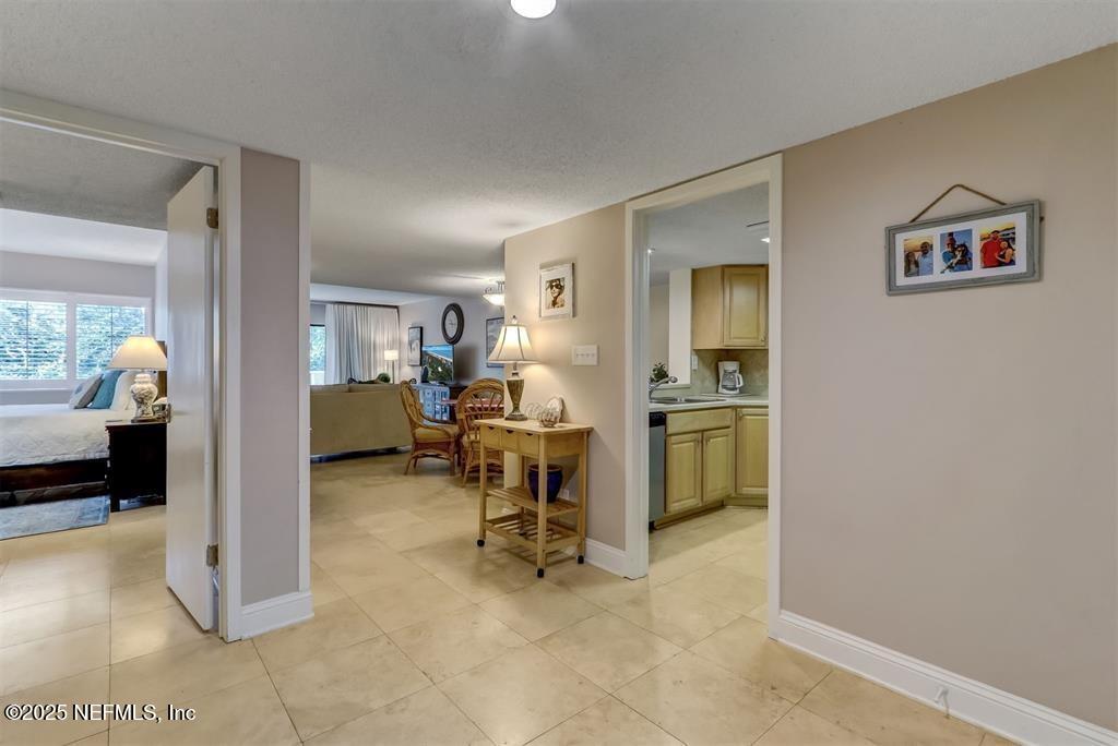 2122 Beachwood Road, Unit 2122 Fernandina Beach, FL 32034 - Photo 6 of 41 a view of kitchen with furniture and a refrigerator