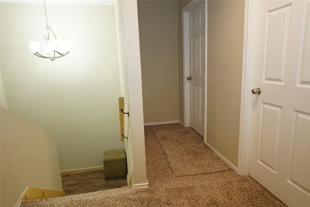 a view of a room with table and chair