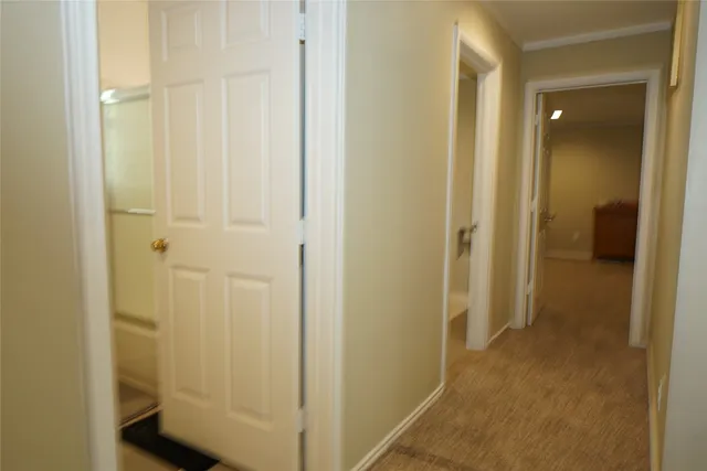 a view of a bathroom with a glass door