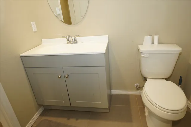 a bathroom with a toilet and a sink