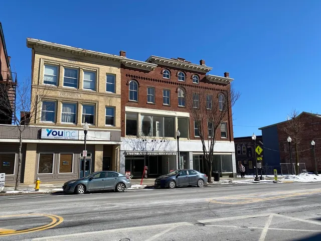 a view of a building and a street