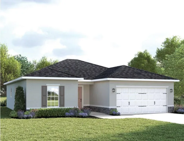 a view of a yard in front view of a house