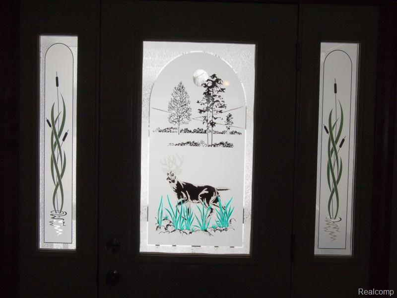 5750 Denhoff Road Kingston, MI 48741 - Photo 6 of 19 5750 front door.jpg