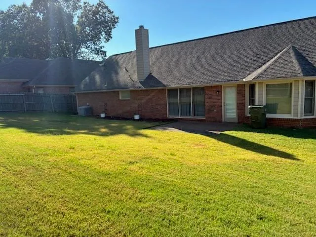 a view of a house with swimming pool