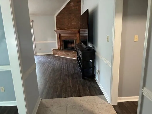 a view of a livingroom from a hallway