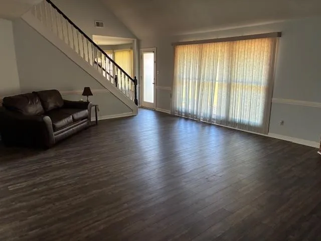 a view of entryway with wooden floor