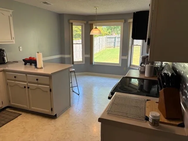 a room with furniture and window