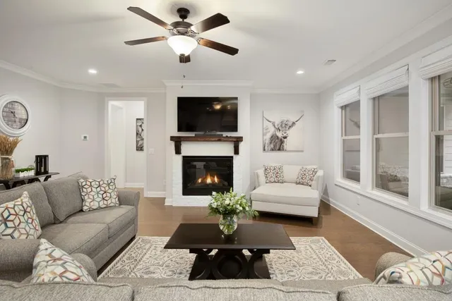 a kitchen with stainless steel appliances kitchen island granite countertop a sink and cabinets