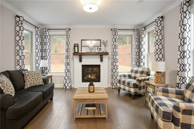a bathroom with a double vanity sink mirror and shower