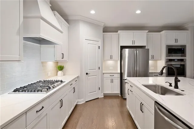 a bathroom with a shower a sink and a mirror