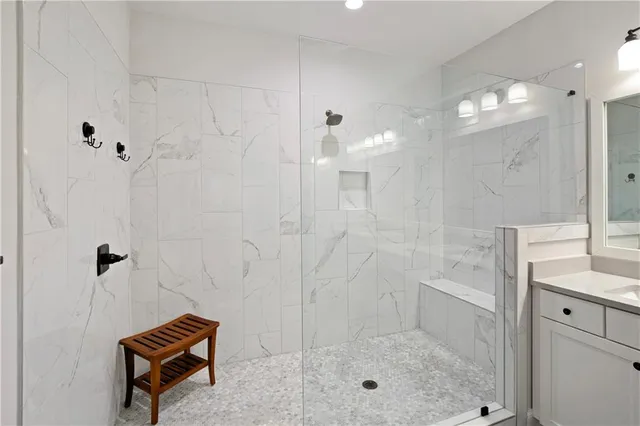 a view of a house with backyard porch and sitting area