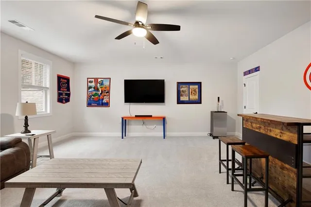 an aerial view of a houses with outdoor space