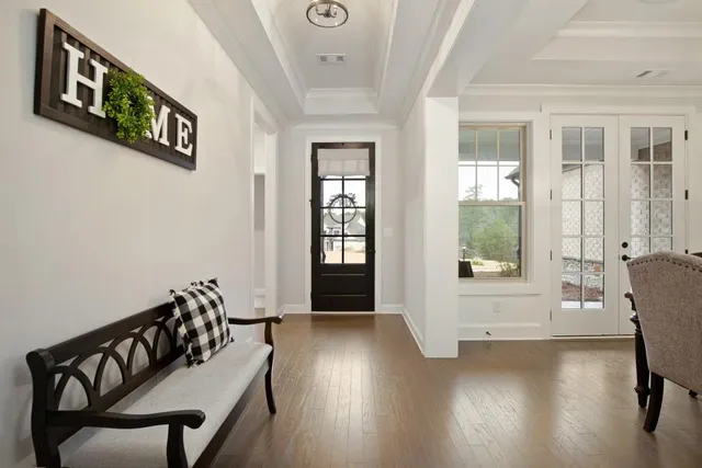 a living room with fireplace furniture and a flat screen tv