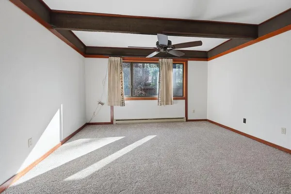 an empty room with windows