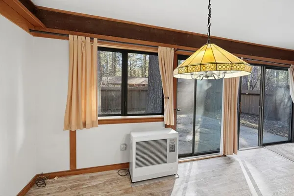 a view of a room with wooden walls