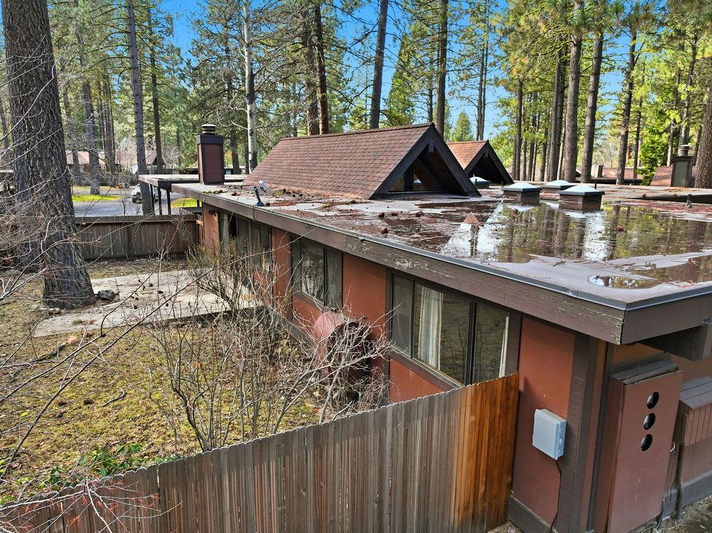 39 Graeagle Meadows Road Graeagle, CA 96103 - Photo 41 of 51 a view of a wooden house with large trees