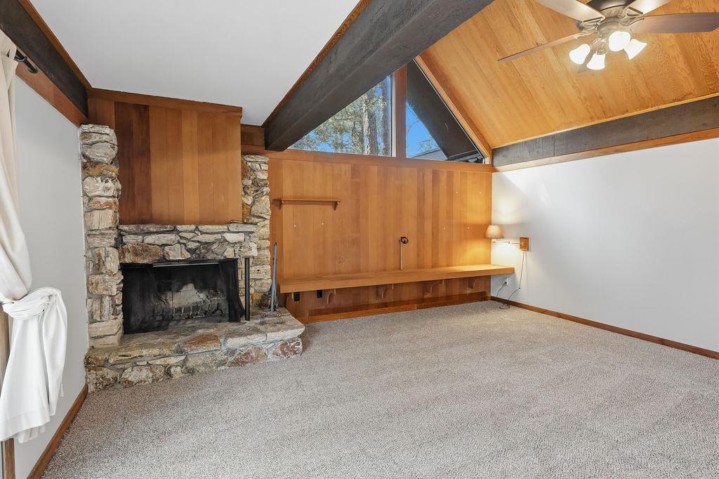 39 Graeagle Meadows Road Graeagle, CA 96103 - Photo 9 of 51 a view of a livingroom with an empty space and a fireplace