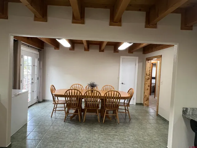 a bedroom with bed and window