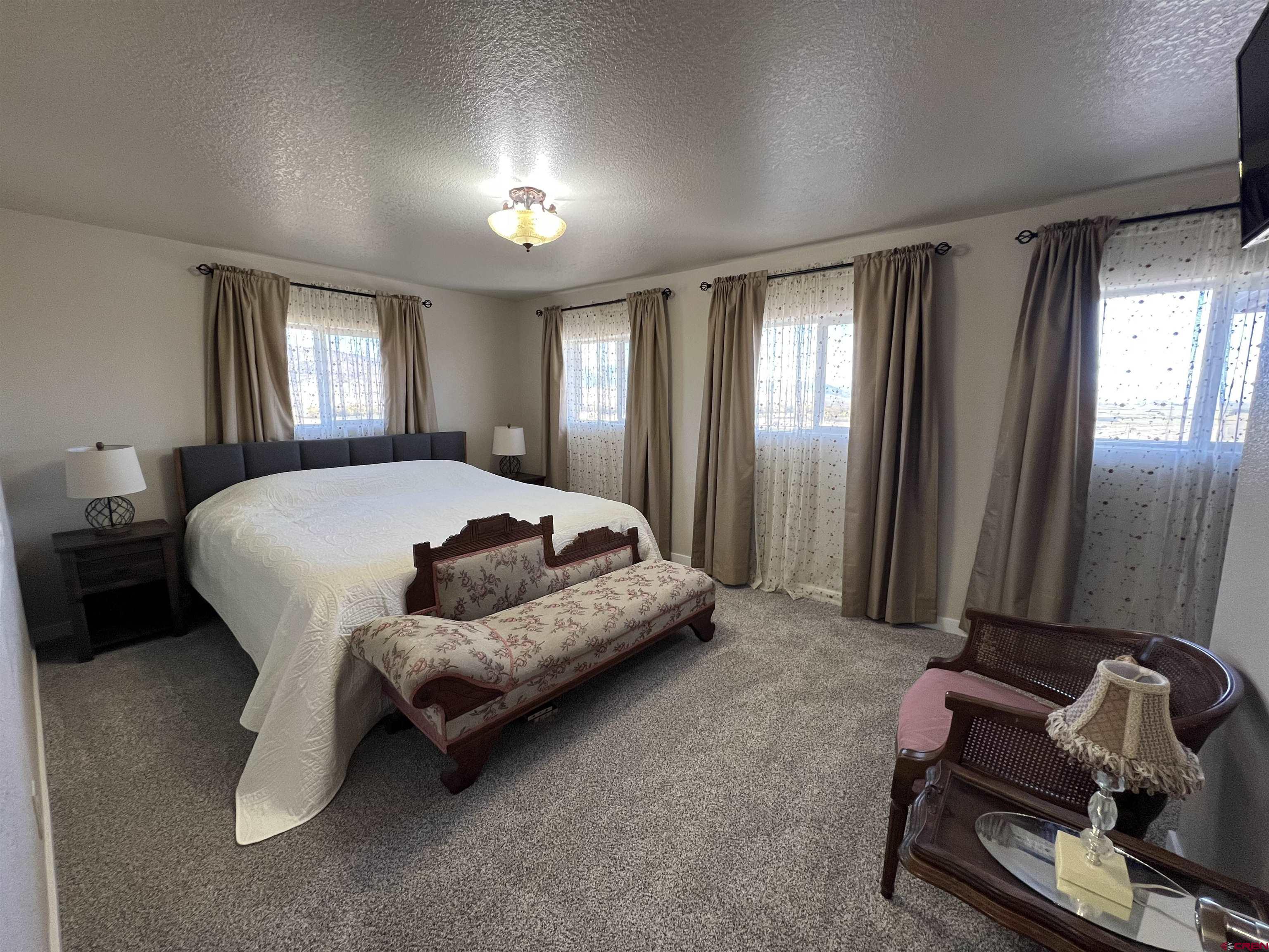 41400 Co Road Saguache, CO 81149 - Photo 19 of 45 a bedroom with bed and window