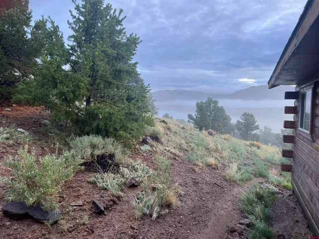 a view of an empty room with storage