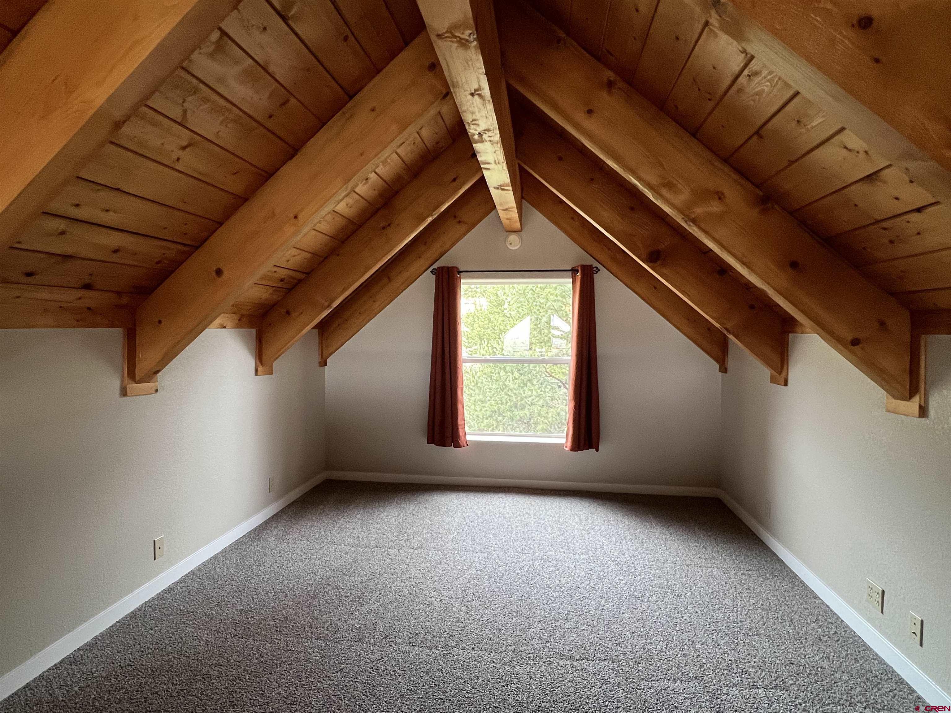 41400 Co Road Saguache, CO 81149 - Photo 6 of 45 a view of an empty room with a window