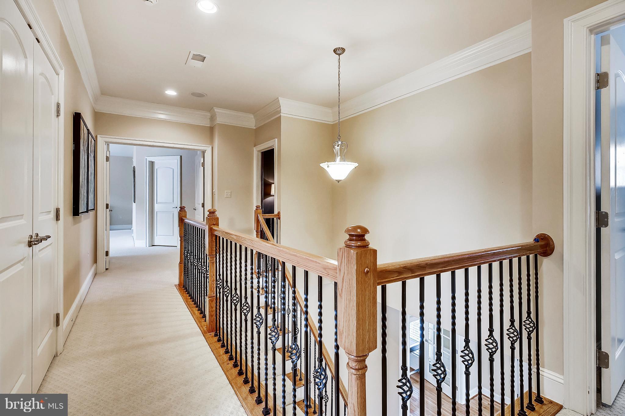 105 Sheppard Road Severna Park, MD 21146 - Photo 24 of 30 Upstairs hallway with high end railings